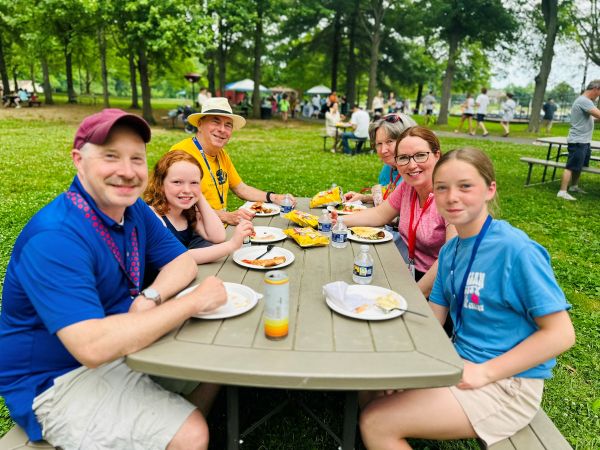family eating at a summer picnic